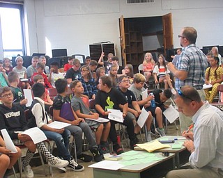 Neighbors | Jessica Harker .Fifth graders at Boardman Center Intermediate School sit in their first band class of the year August 26.