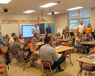 Neighbors | Jessica Harker .Incoming kindergartners and their parents piled into the students new classrooms to meet with their teachers during Poland Union Elementary School's Kindergarten Orientation on Aug. 19.