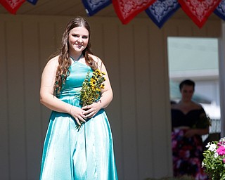 Sydney Lewis, of Canfield, stands on stage before the crowning this year's Outstanding Youth during the Mahoning County Junior Fair Youth Day Ceremony on Thursday. Lewis was crowned this year's female Outstanding Youth. EMILY MATTHEWS | THE VINDICATOR