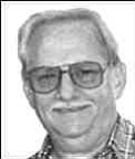CARL E. MILLER