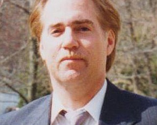 MARK R. THOMAS