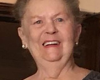 CAROLE E. THOMAS
