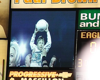 Coachs Son holds the Ball