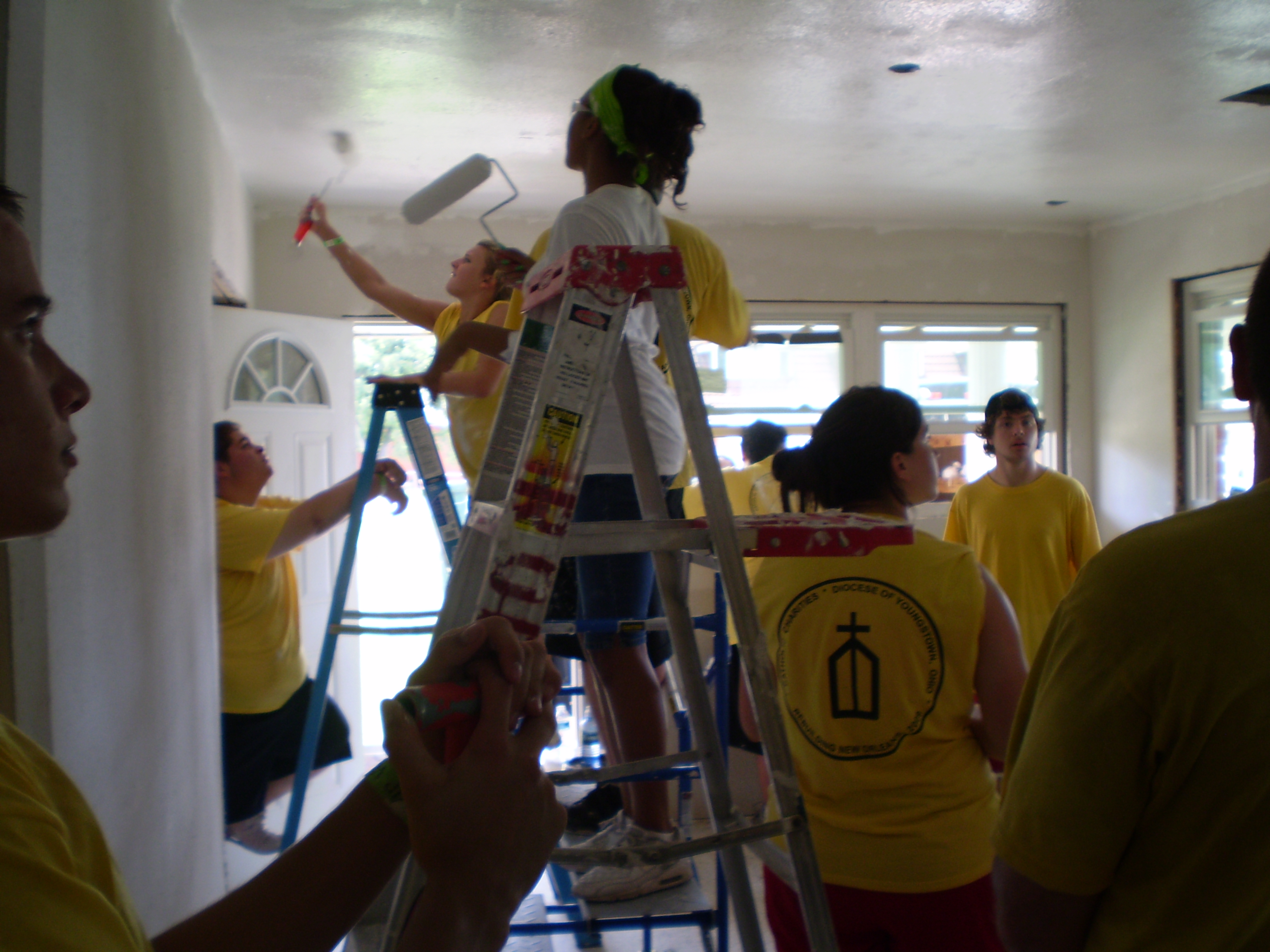 Painting the livingroom ceiling.