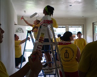 Painting the livingroom ceiling.