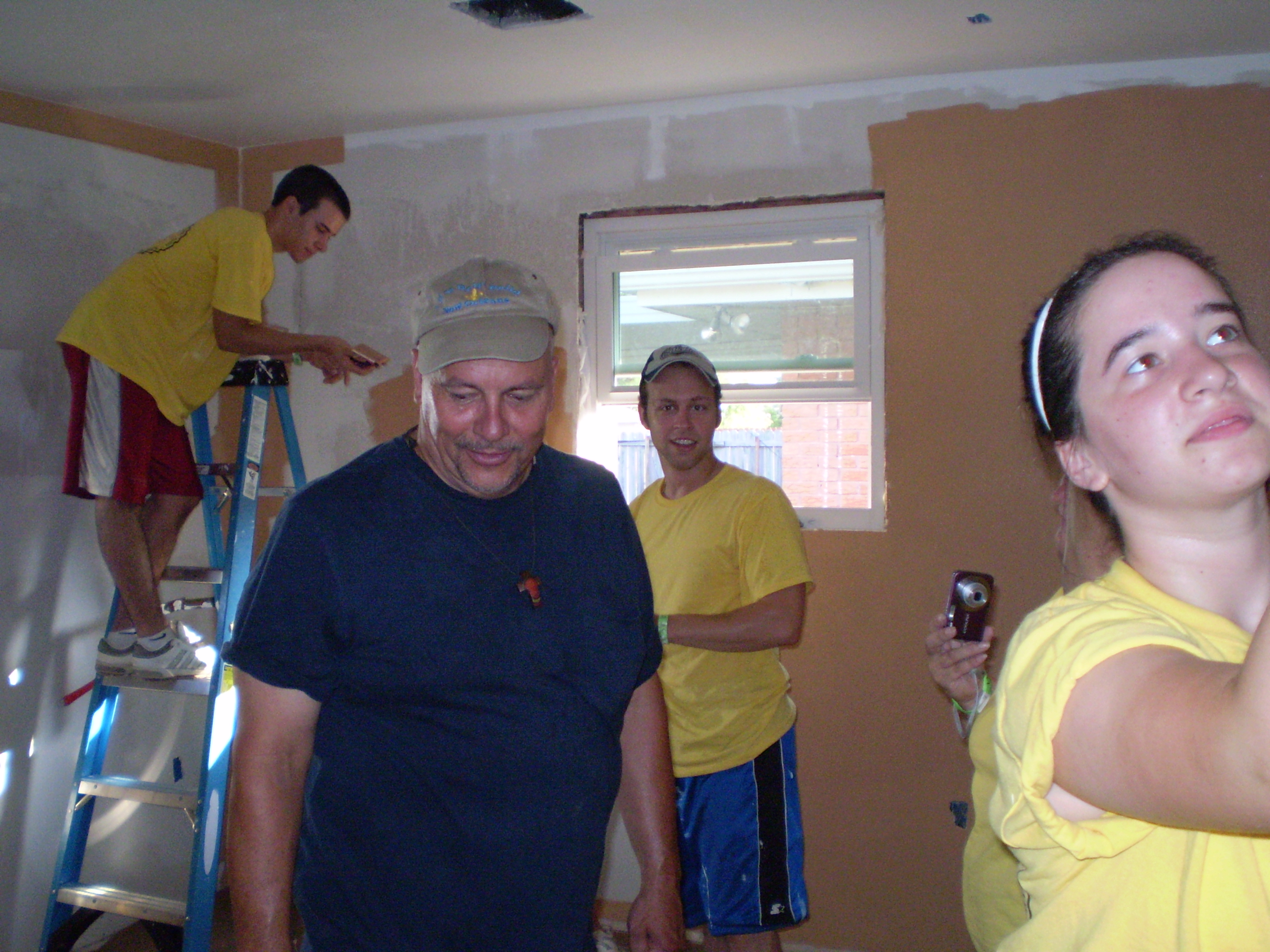 Painting the walls and installing cabinets