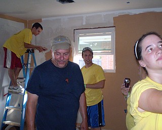 Painting the walls and installing cabinets